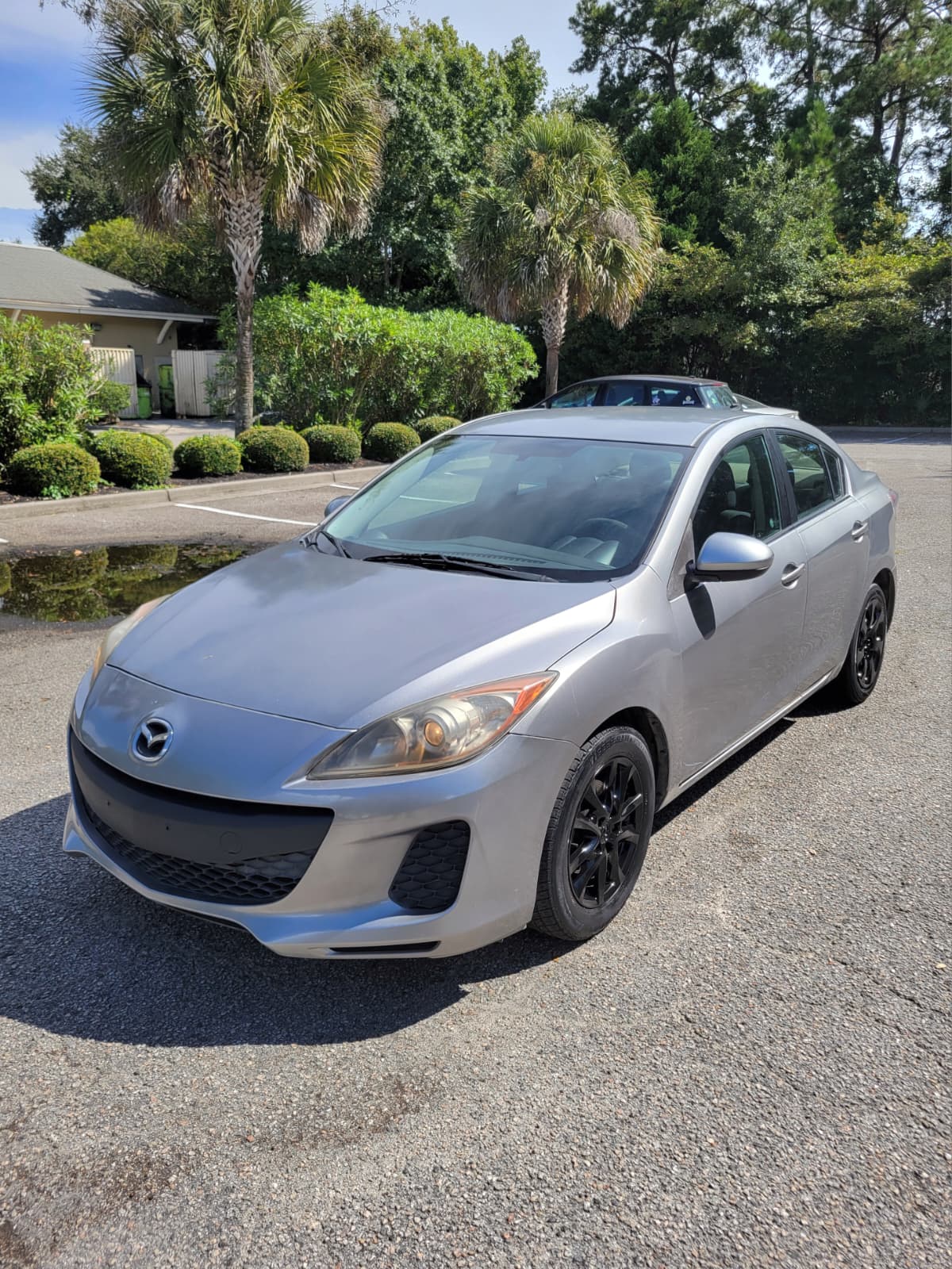 2012 Mazda3 i Sport sedan in Liquid Silver